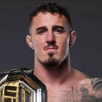 Том Аспиналл